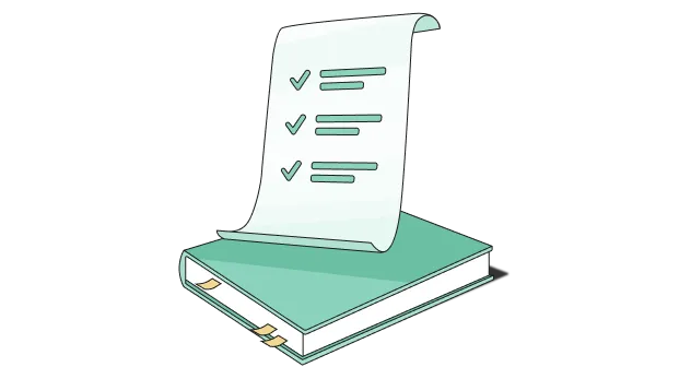 A book with a paper on top of it.